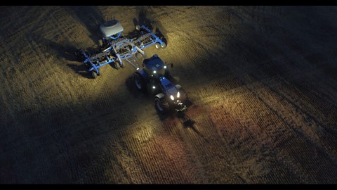 New Holland T8 NHDrive Autonomous Concept Tractor in the field with the New Holland 2085 Air Disc Drill Working at Night