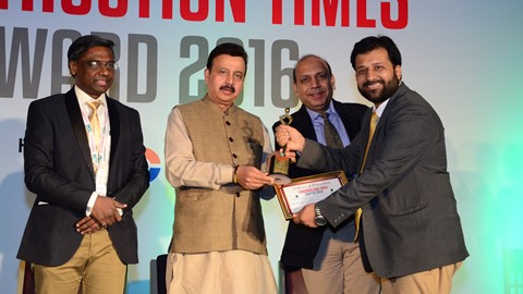 CASE India receiving the Best Construction Equipment Company of the Year Award