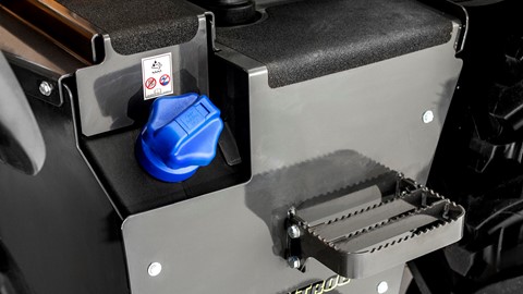 Easy access steps enable unfettered access to the backhoe loader's cab