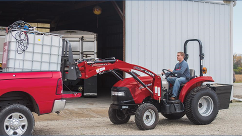 Farmall 50C L360A Loader moving a bunded tank
