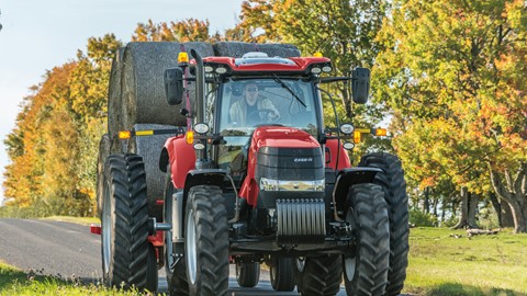 Case IH Puma 240 transporting bales