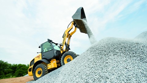 New Holland Construction Wheel Loader moving aggregate
