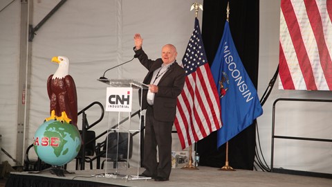 Kaleb Case greets the assembled crowd in Racine