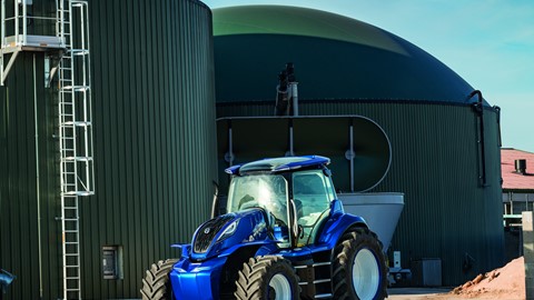 The methane powered concept tractor in front of the biodigesters