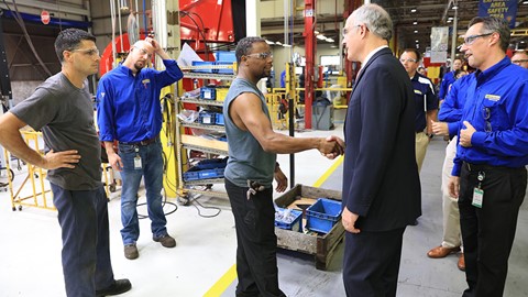 U.S. Senator Bob Casey greets employees during a New Holland plant tour