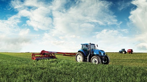 New Holland tractor and Discbine 313