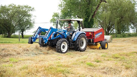 WORKMASTER Utility tractor with RF Fixed Chamber Round Baler