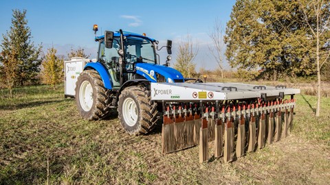 A New Holland tractor using XPower: zero-chemical weed control, through the use of electro-herbicide technology