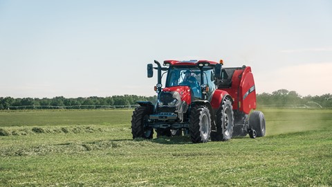 Maxxum 145 with RB565 round baler