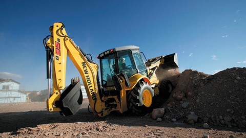 Retroescavadeira New Holland Construction em ação