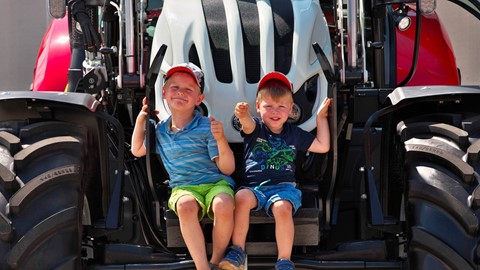 STEYR_Open_Days_Young_Visitors_on_Tractor