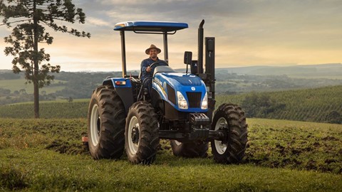 Farmer and machine hard at work