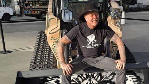 Metallica frontman James Hetfield with the special edition CASE compact track loader