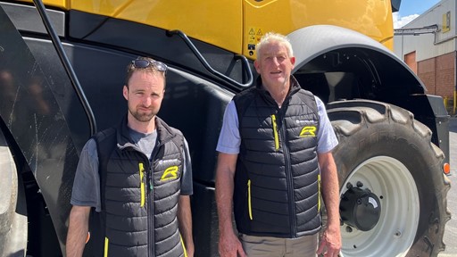 John Clark and son Matthew with the New Holland FR780 Forage Cruiser