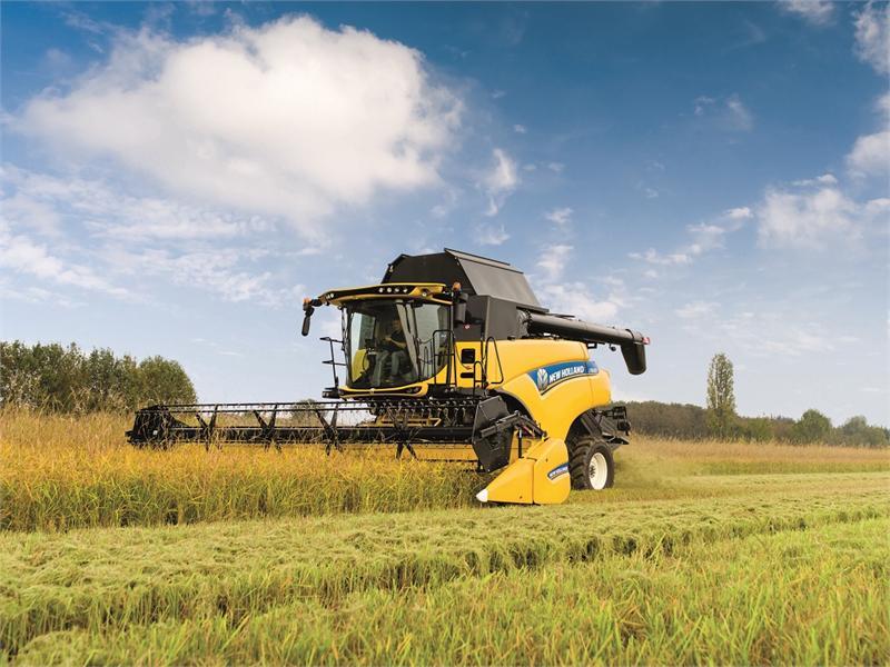 New Holland 8.80. Зерноуборочный комбайн Нью Холланд. Комбайн Нью Холланд CR 8.90. Комбайн Нью Холланд СХ 8.80.