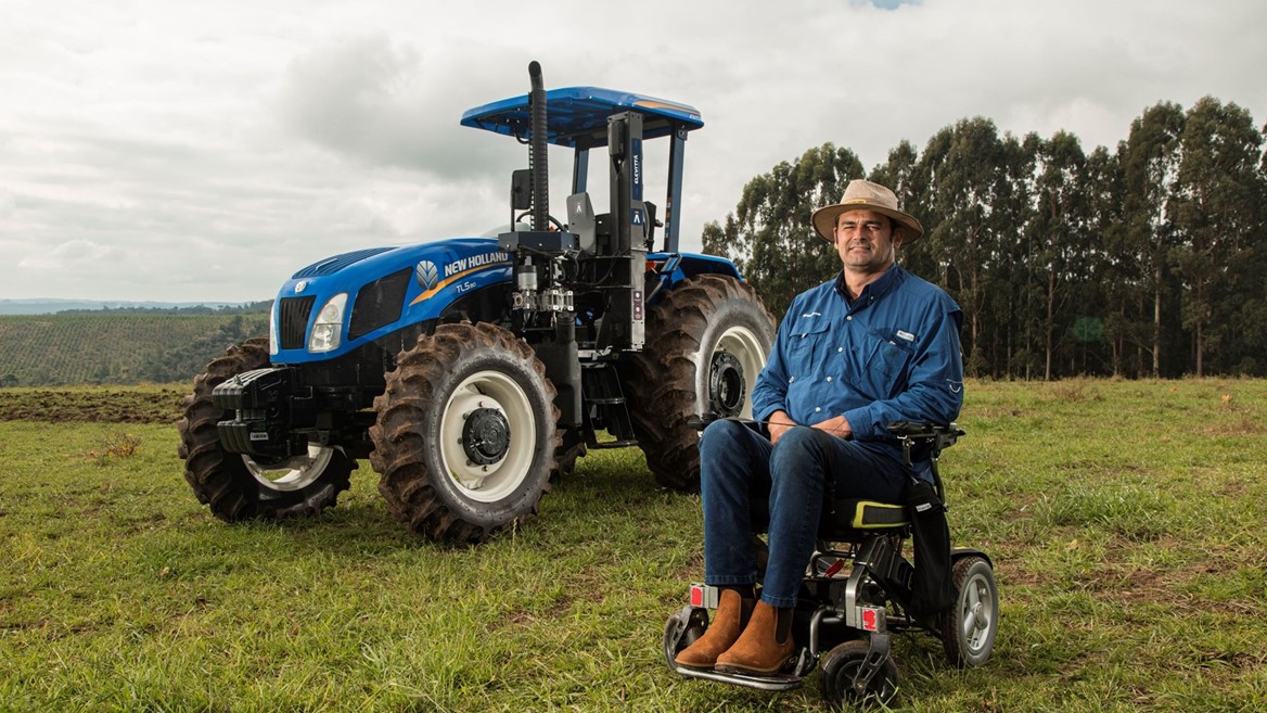 The farmer poses for a photo before work