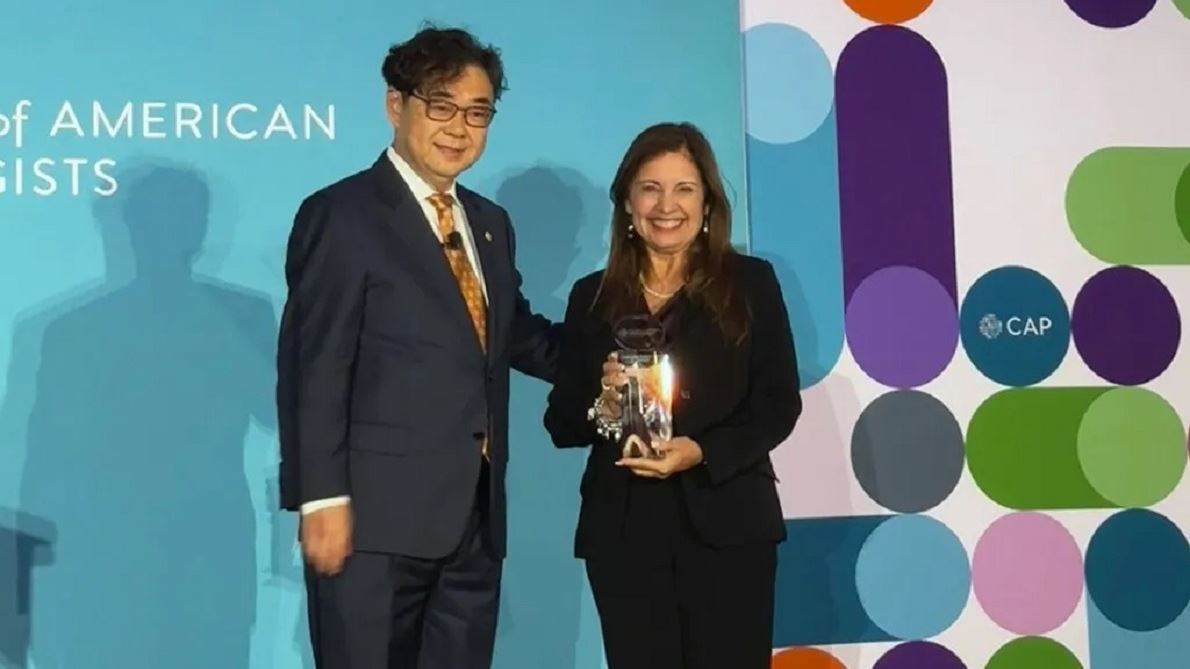A Tip of the CAP Miller School Pathologist Recognized with Lifetime Achievement Award