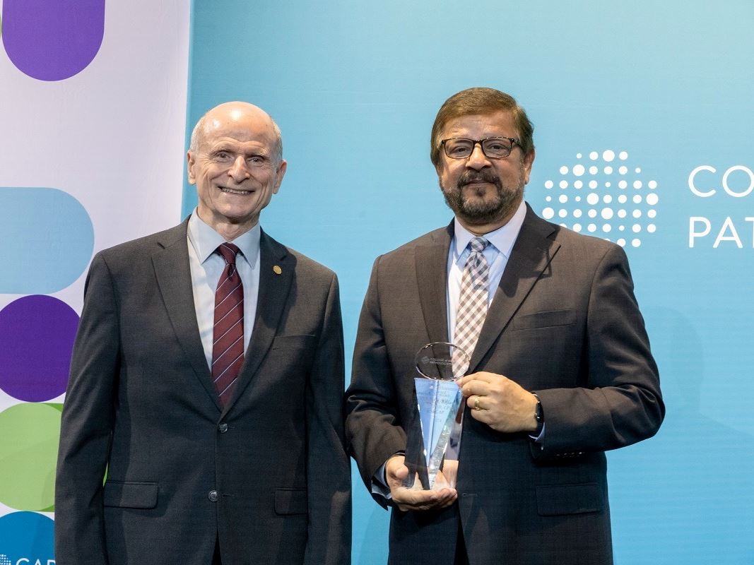 Dr Amyn M Rojiani right has been honored with the College of American Pathologists Lifetime Achievement Award