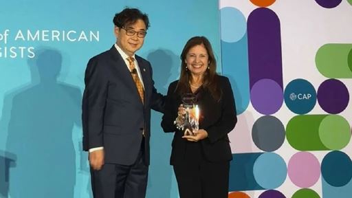 A Tip of the CAP Miller School Pathologist Recognized with Lifetime Achievement Award