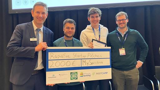 The winner Ben Schwedhelm from MySpirulina 2nd from right is congratulated by Mario Verbeek RootsCamp