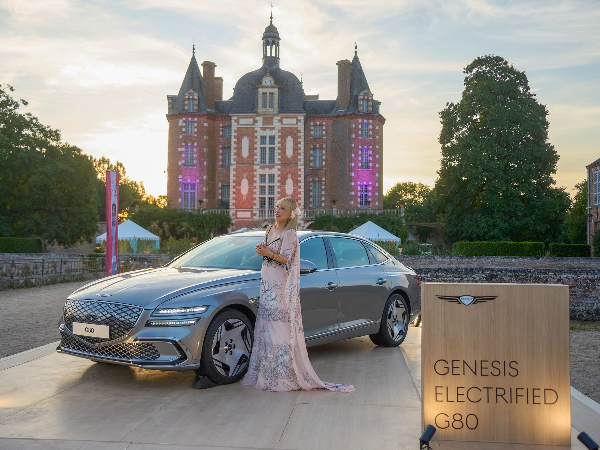 SOUTH KOREAN SOPARANO SUMI JO WITH GENESIS ELECTRIFIED G80
