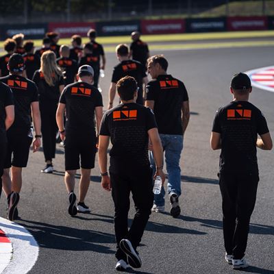 GENESIS MAGMA RACING TEAM MEMBERS DOING A LAP OF THE FUJI SPEEDWAY CIRCUIT ON FOOT TO ASSESS TRACK CONDITIONS AHEAD