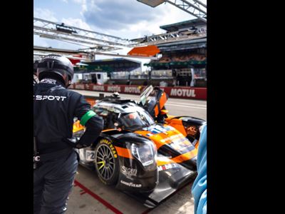 CREW MEMBERS OF THE GENESIS MAGMA RACING TEAM EXAMINE THE CAR IN THE PIT AT CIRCUIT PAUL RICARD