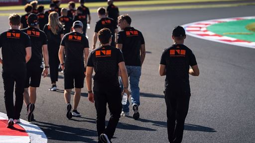 GENESIS MAGMA RACING TEAM MEMBERS DOING A LAP OF THE FUJI SPEEDWAY CIRCUIT ON FOOT TO ASSESS TRACK CONDITIONS AHEAD