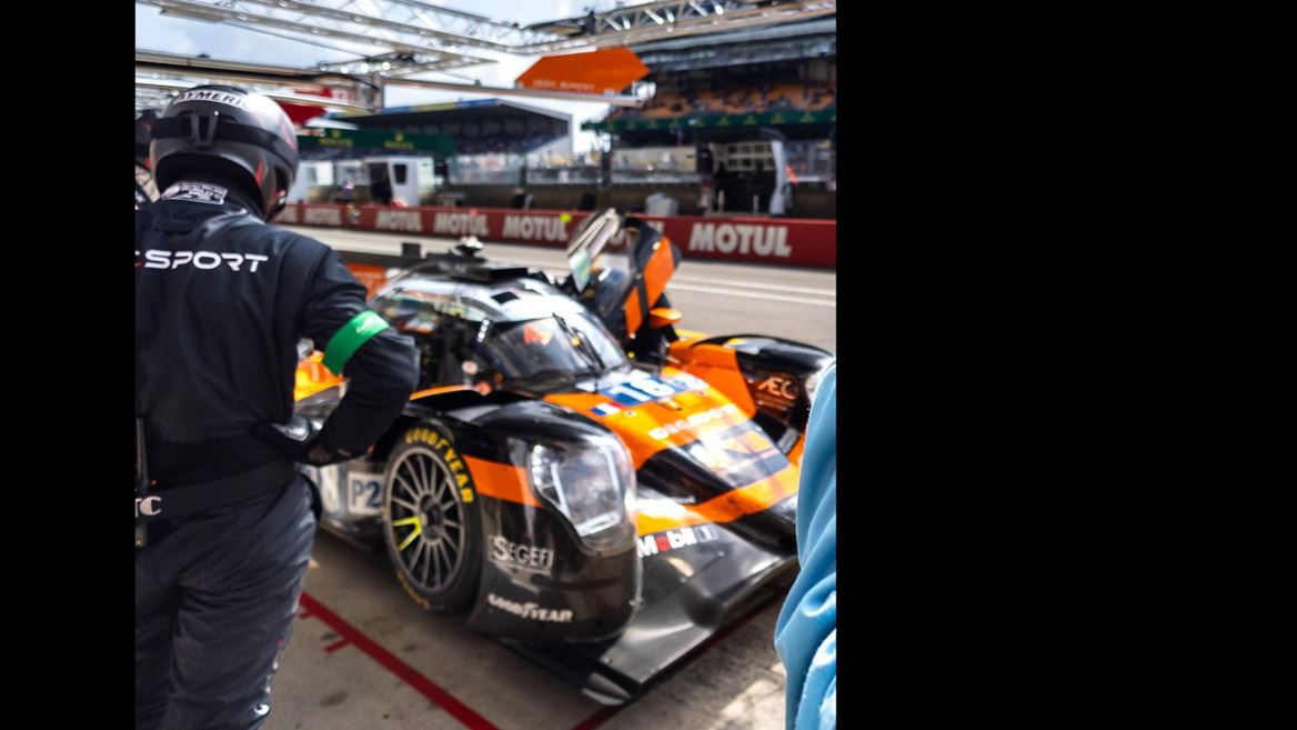 CREW MEMBERS OF THE GENESIS MAGMA RACING TEAM EXAMINE THE CAR IN THE PIT AT CIRCUIT PAUL RICARD