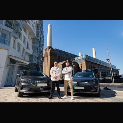 JORDAN SMITH AND HIS CADDIE COLLECT GENESIS CARS FOLLOWING GENESIS SCOTTISH OPEN HOLE IN ONE