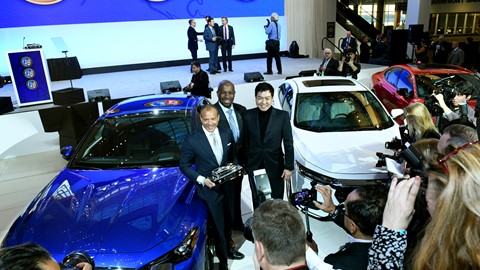 GENESIS EXECUTIVES RECEIVE THE NORTH AMERICAN CAR OF THE YEAR AWARD (FROM LEFT, MANFRED FITZGERALD, ERWIN RAPHAEL, SAN
