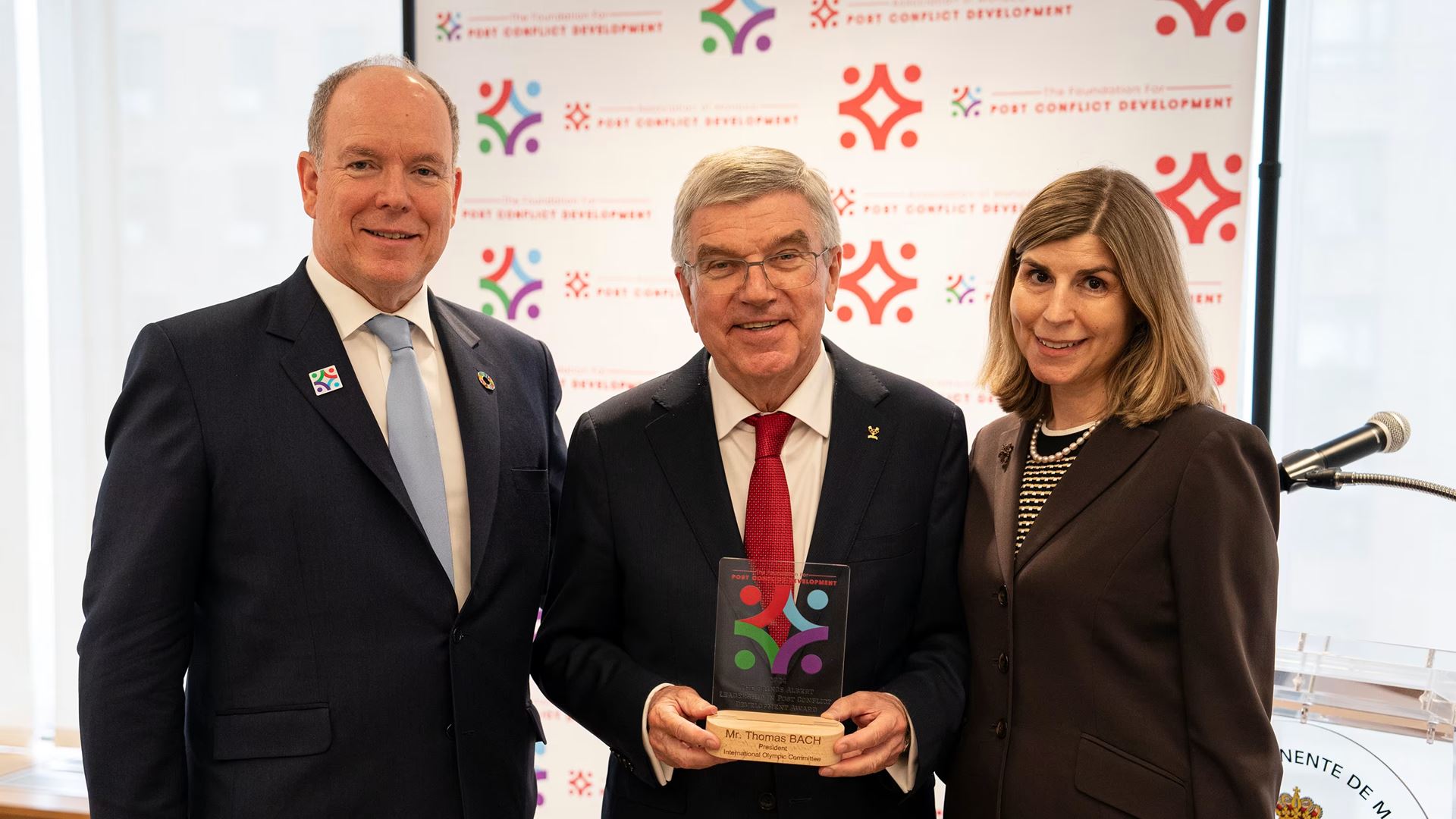 HSH Prince Albert II of Monaco IOC President Thomas Bach and Claudia Abate the Founder and Executive Director