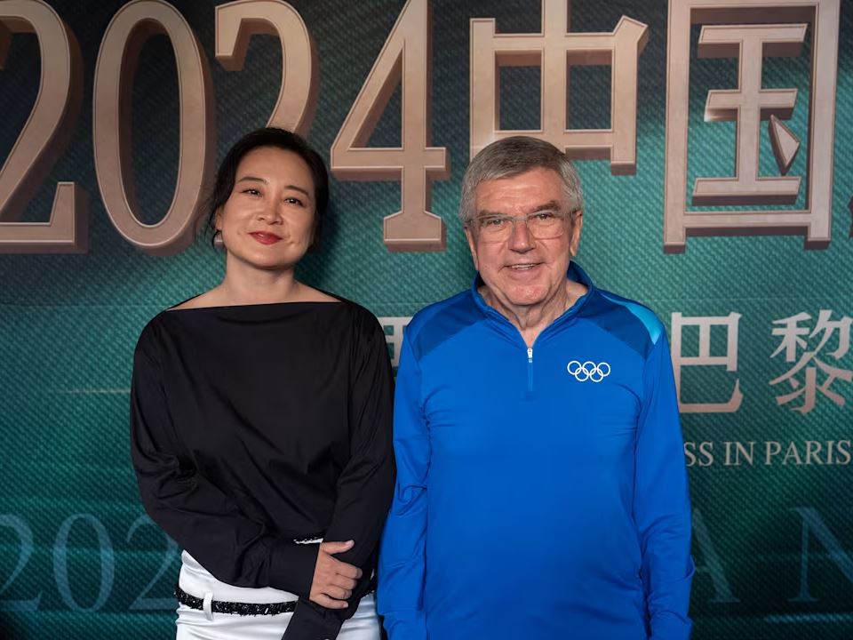 Award winning actress director and producer Jia Ling and IOC President Thomas Bach