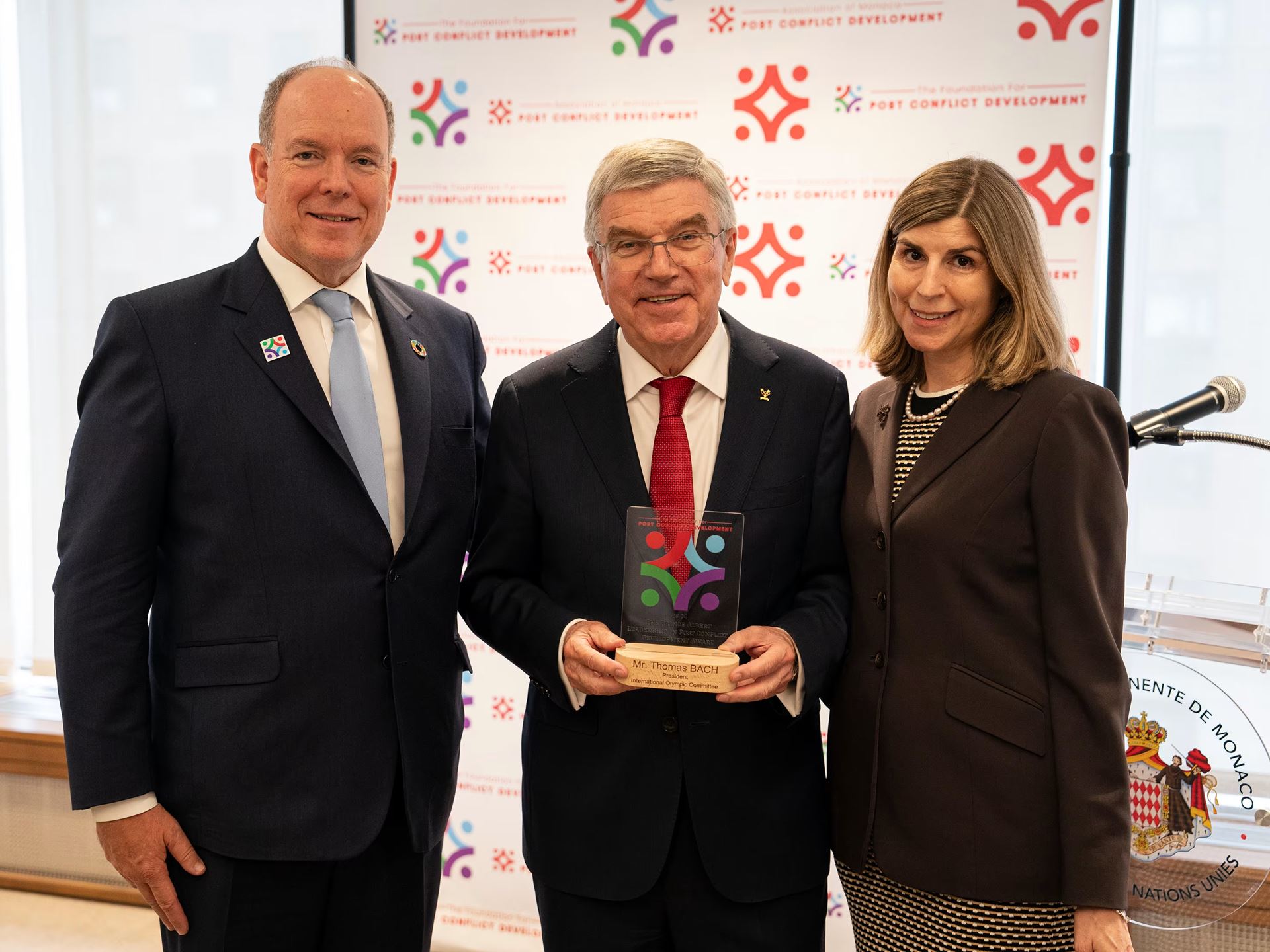 HSH Prince Albert II of Monaco IOC President Thomas Bach and Claudia Abate the Founder and Executive Director
