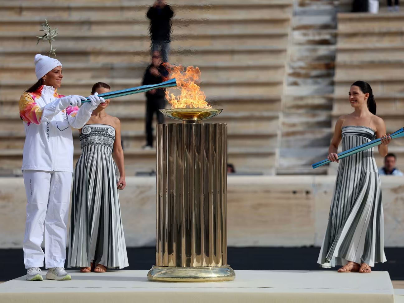Olympic flame handed over in Athens as it begins journey to Italy for Milano Cortina 2026