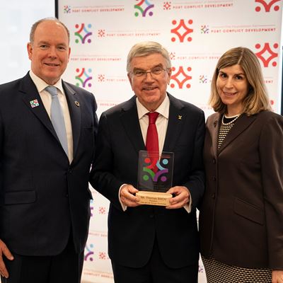 HSH Prince Albert II of Monaco IOC President Thomas Bach and Claudia Abate the Founder and Executive Director