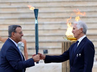 Olympic flame handed over in Athens as it begins journey to Italy for Milano Cortina 2026