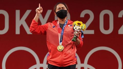 Hidilyn Diaz winning a first-ever Olympic gold medal for the Philippines in weightlifting