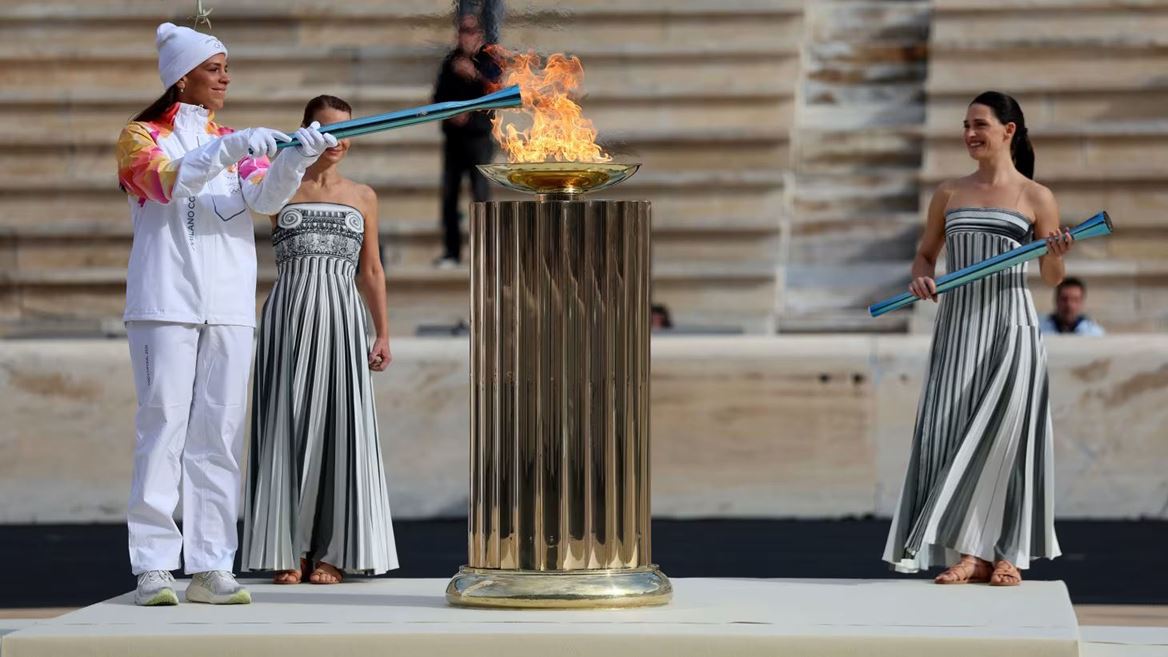 Olympic flame handed over in Athens as it begins journey to Italy for Milano Cortina 2026
