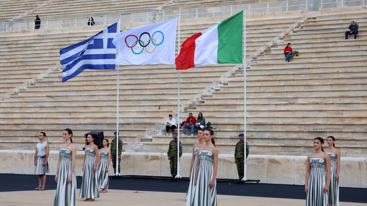 Olympic flame handed over in Athens as it begins journey to Italy for Milano Cortina 2026