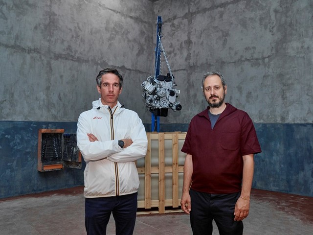 Carlo Moroni, Head of FPT Industrial Brand Communication, and Gian Maria Tosatti in front of the eng...