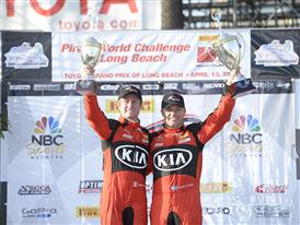 Kia Racing drivers Nic Jonsson and Mark Wilkins celebrate a double-podium finish on the Streets of Long Beach.