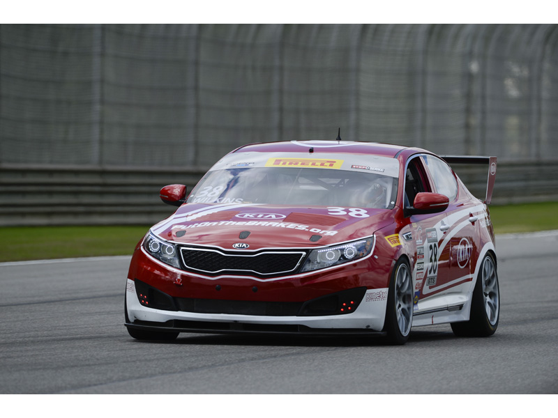 Kia Racing makes competition debut in turbocharged Optimas at Road America. Kia Racing makes competition debut in turbocharged Optimas at Road America.