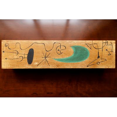 Hand-carved, painted and varnished wood box also composed by Miró.
