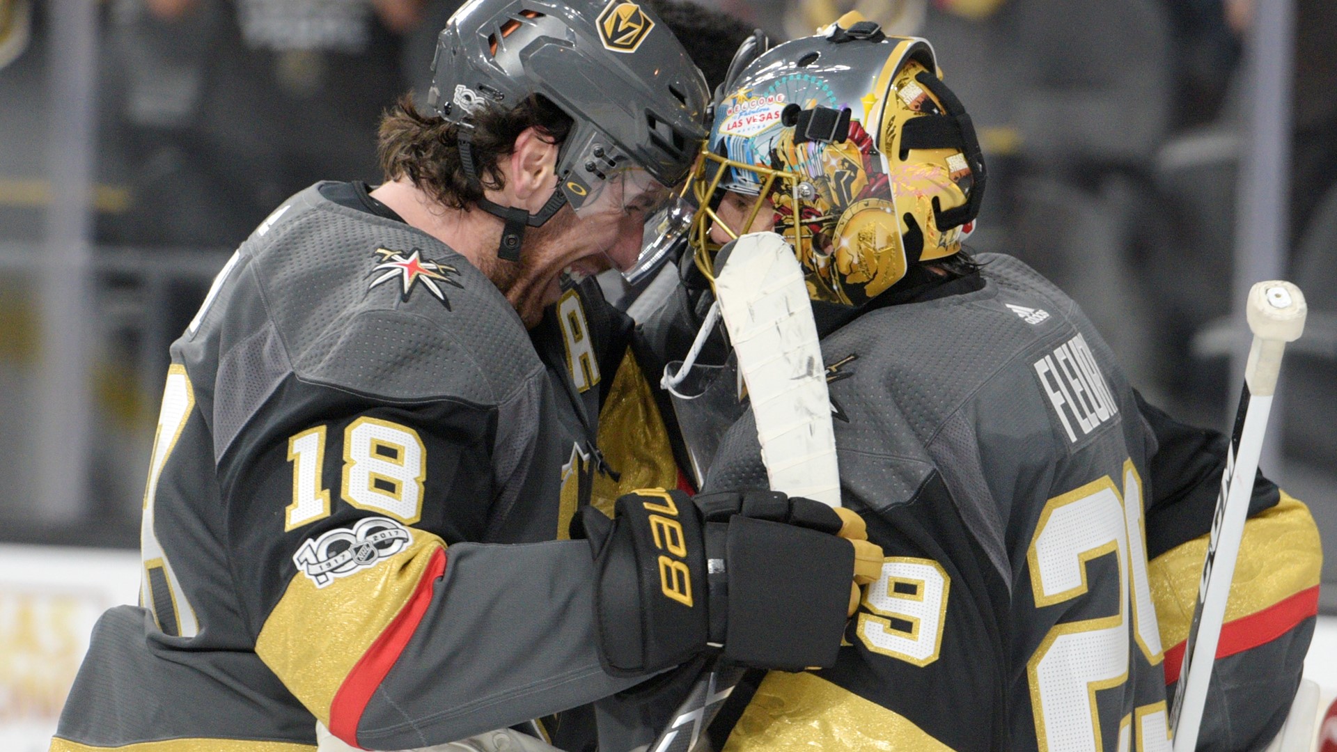Vegas Golden Knights right wing James Neal (18) congratulates Vegas Golden Knights goalie Marc-Andre Fleury (29)