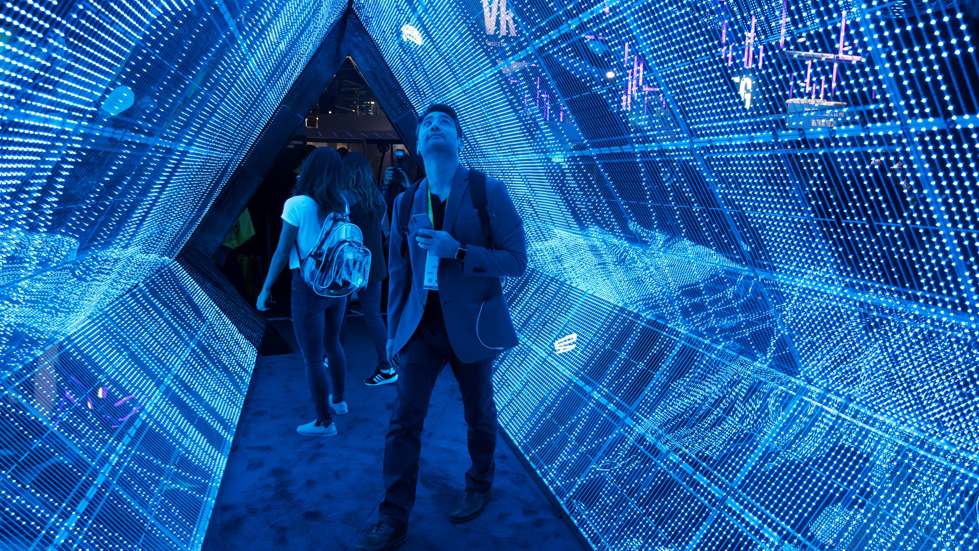 Todd Cox checks out a 5G tunnel from Intel during the second day of CES