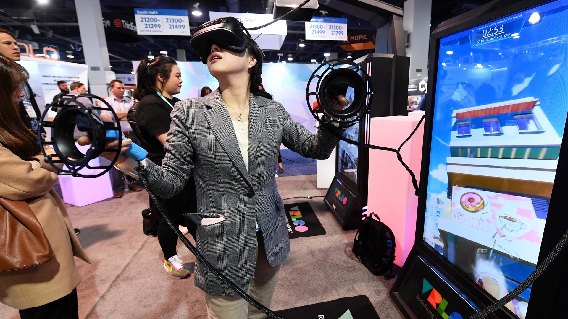 An attendee tries out a virtual reality game