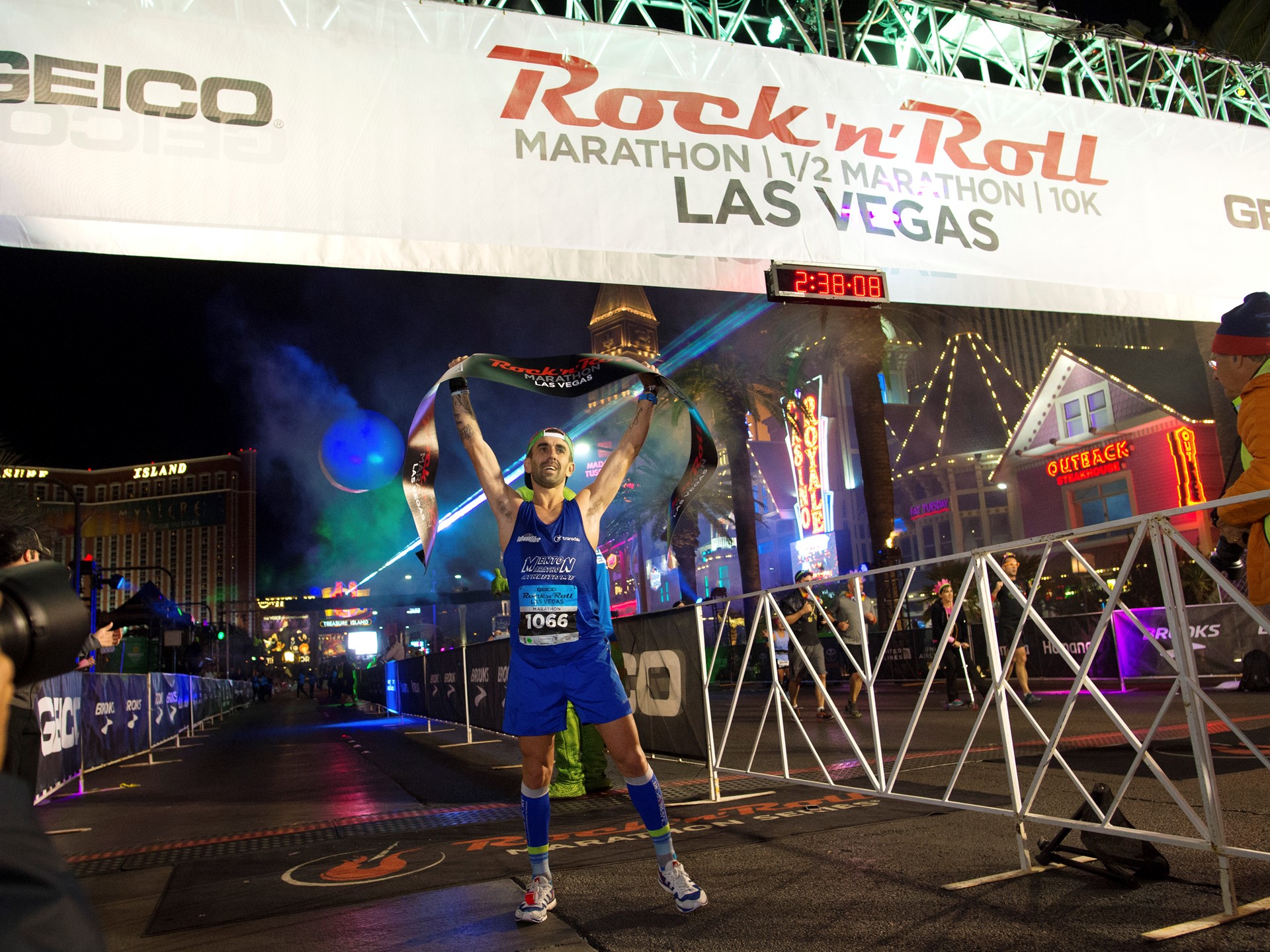 Marathon Winner Gilles Rubio Holds The Finish Line Banner