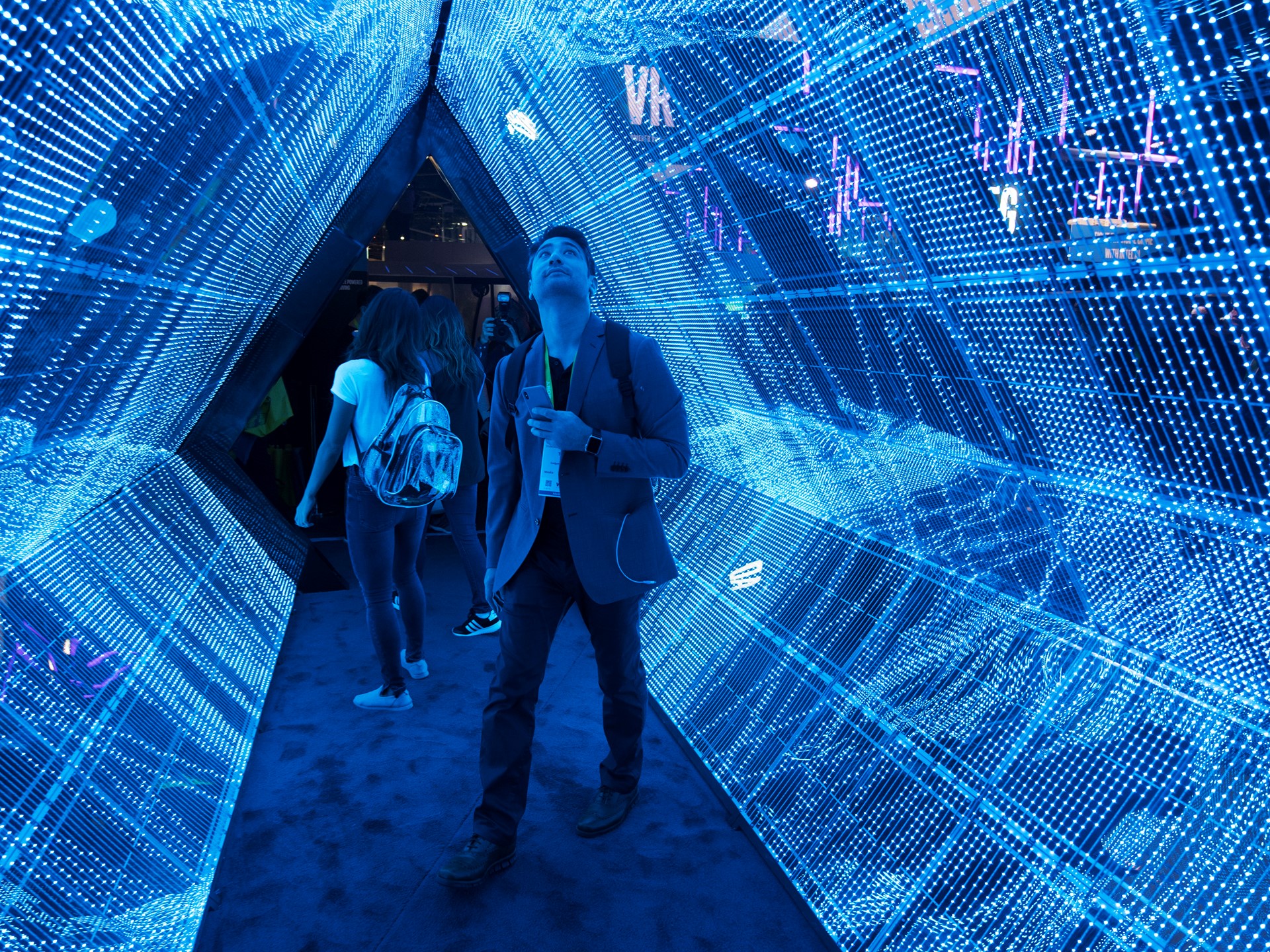 Todd Cox checks out a 5G tunnel from Intel during the second day of CES