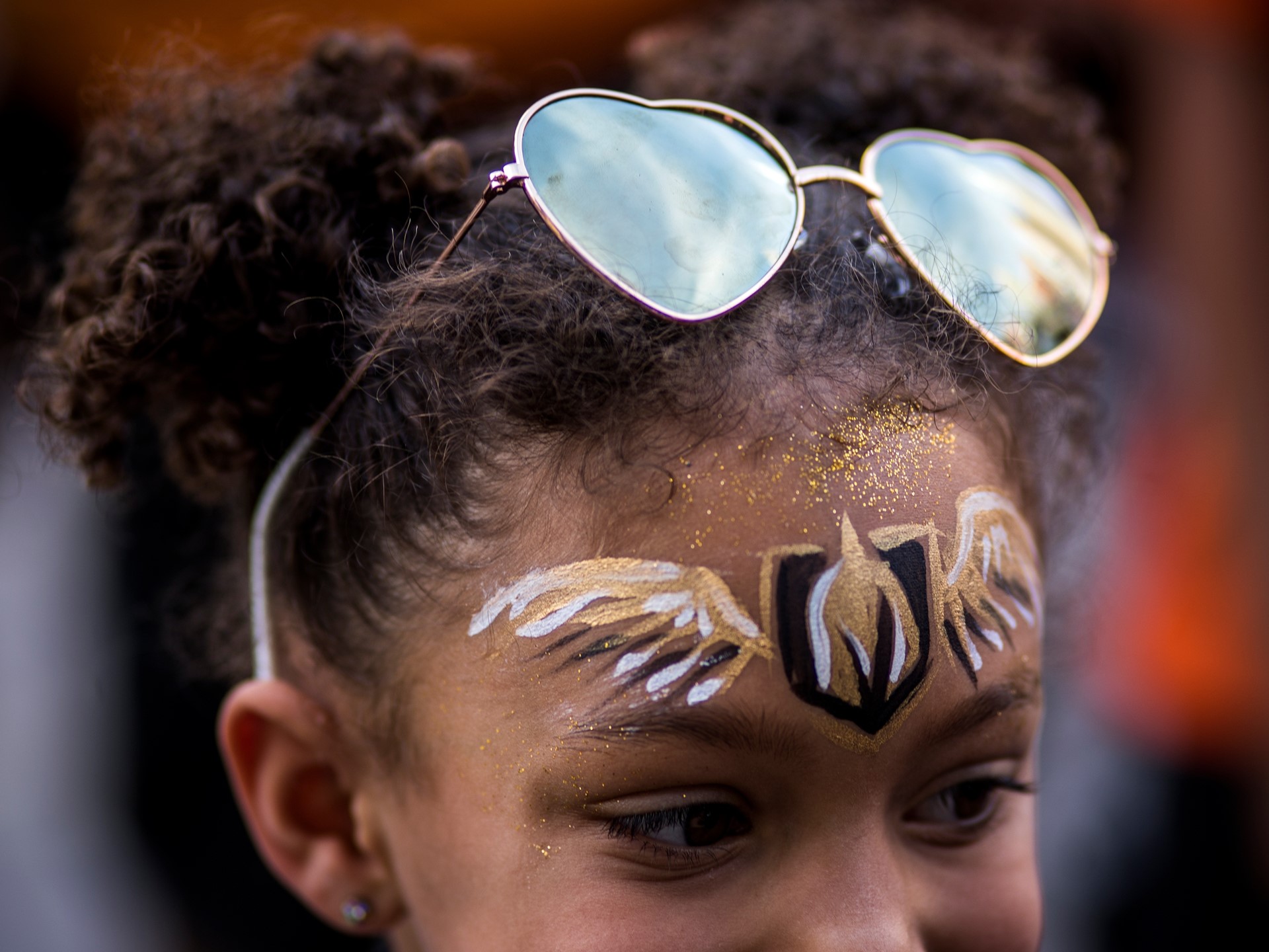 Tenlee Jenkins, 6, has her face painted before the start of Game 6